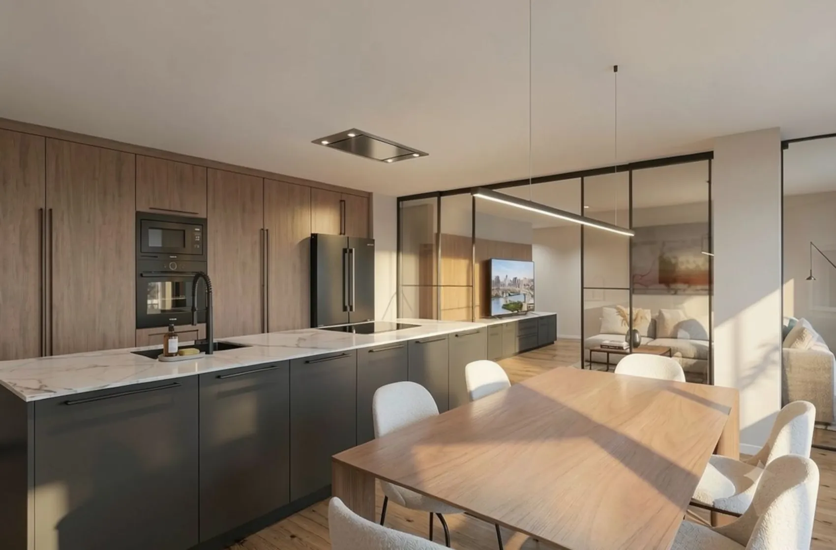 Cocina de showroom de B interiorismo en Lugo con isla, mobiliario a medida y zona de estar