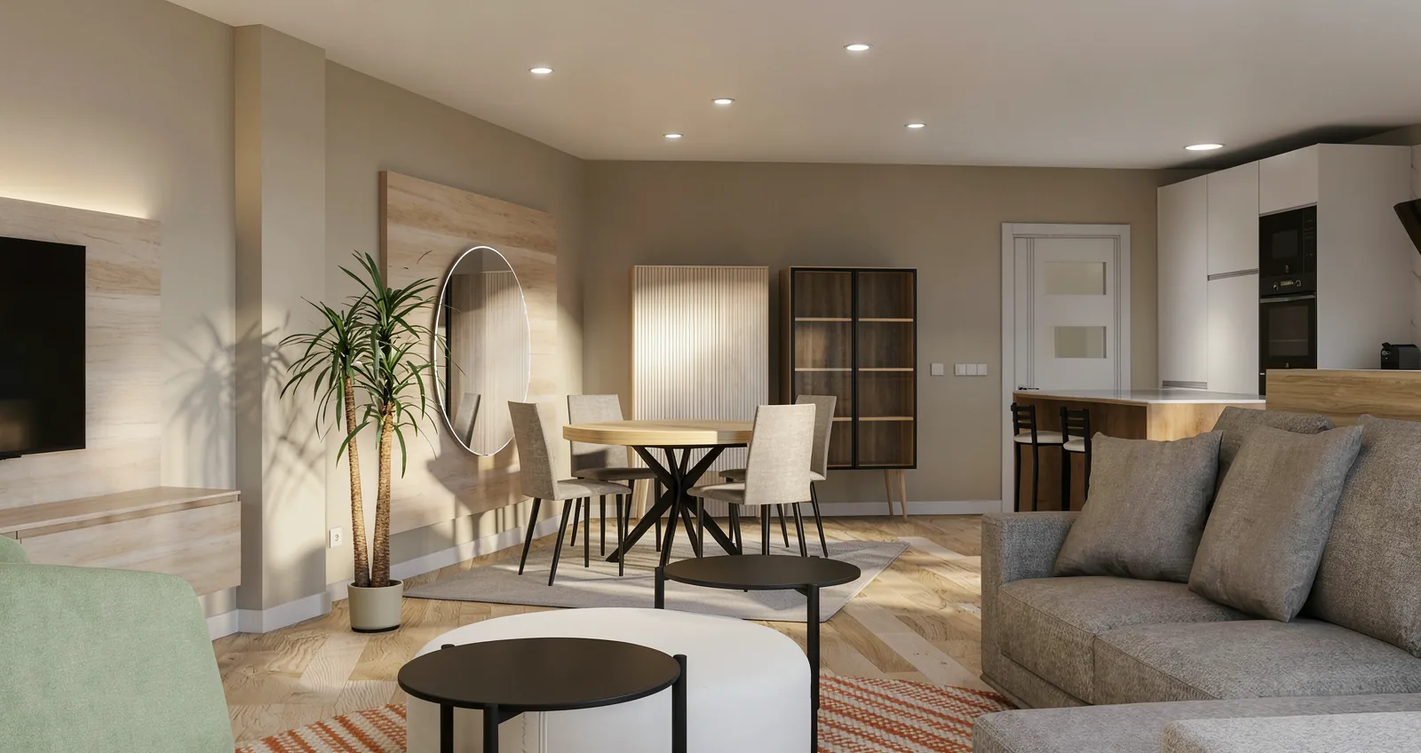 Visualización de zona de día con salón, comedor y cocina relacionados mediante mobiliario, iluminación y materiales